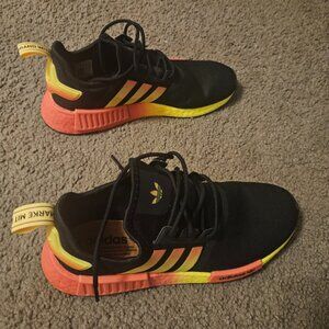 Black, orange, and yellow gym shoes